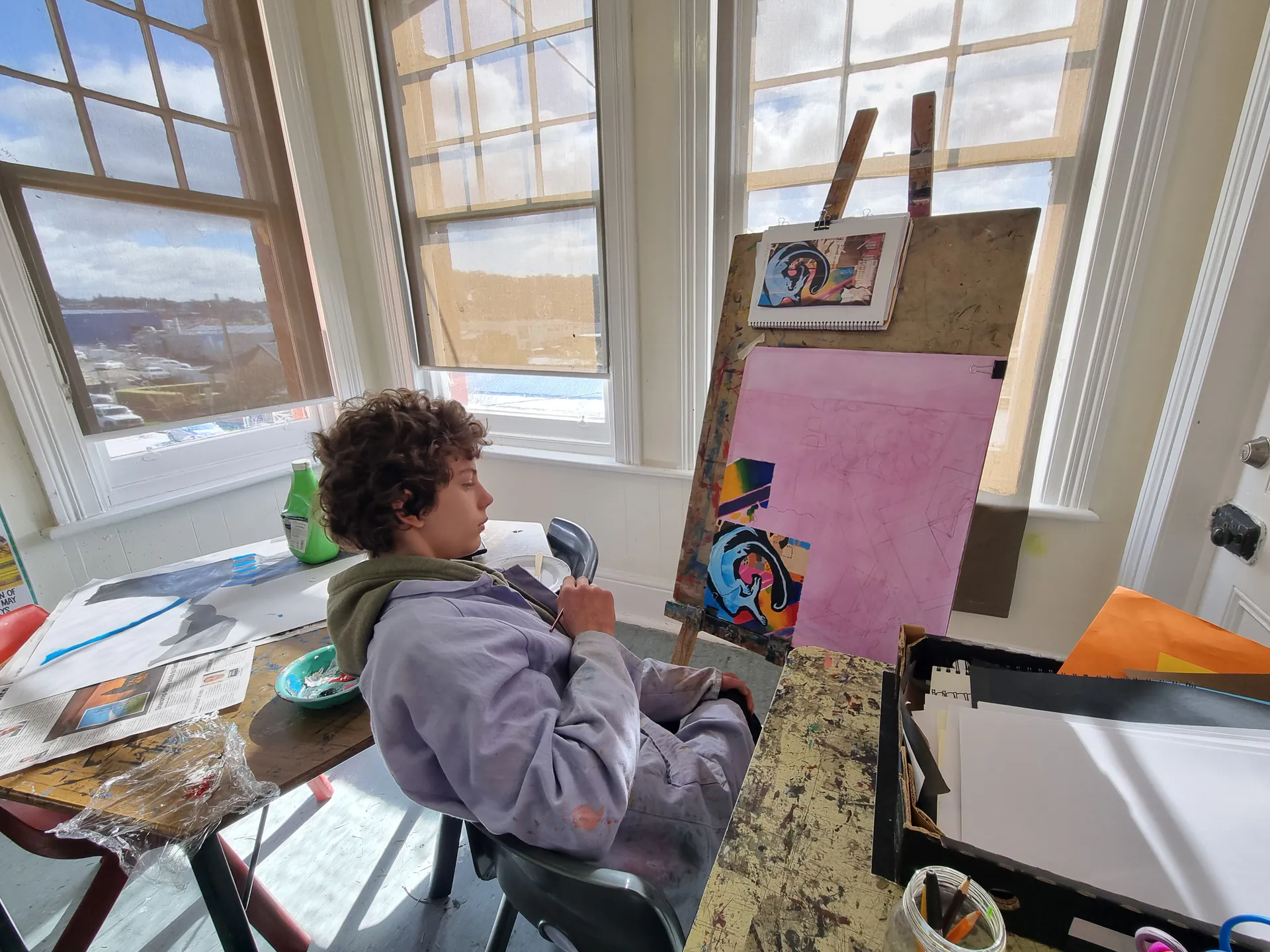 Student developing an artwork in the studio