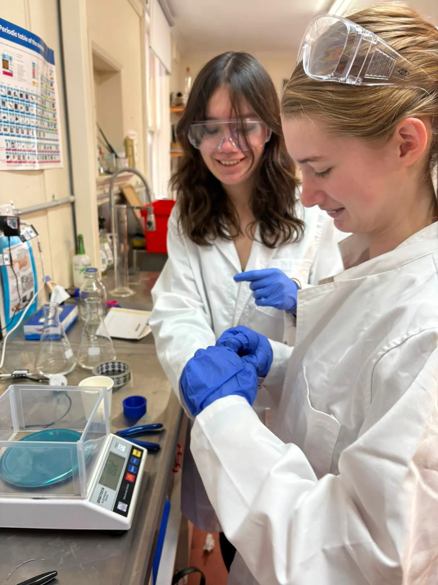 Students carrying out a hands-on science experiment